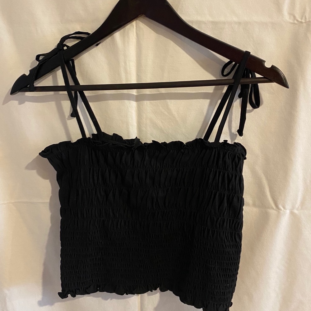 Black ruffled top